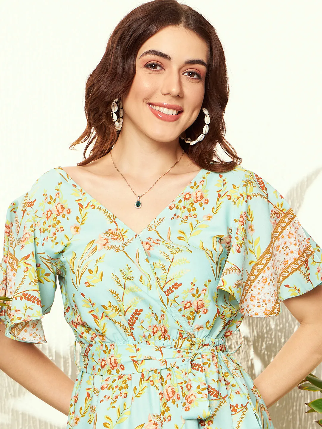 Berrylush Women Green & Brown Floral Printed V-Neck Flutter Sleeve Waist Tie-Up Pleated Mini Playsuit