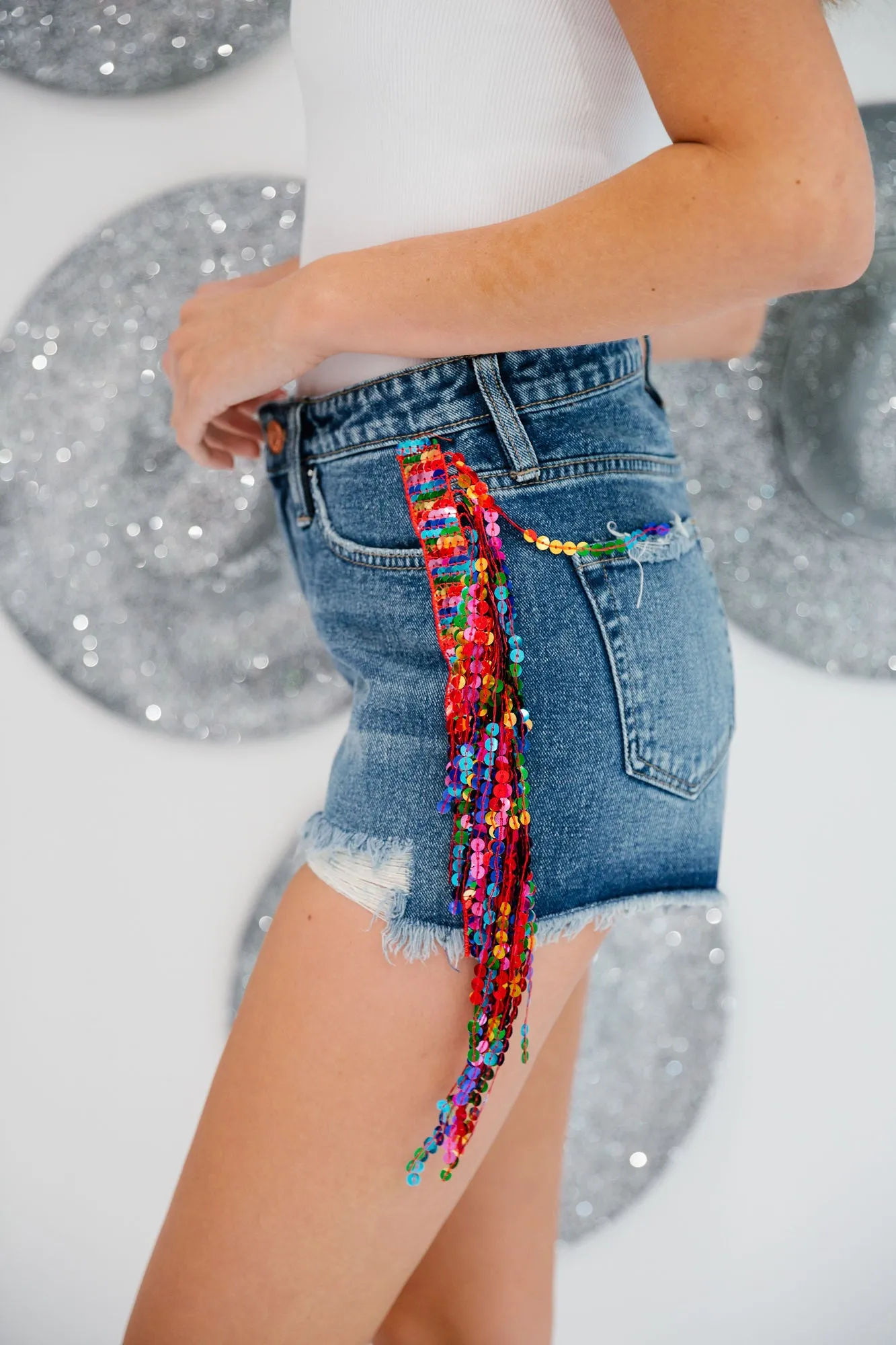 NEON COWGIRL DENIM FRINGE SHORTS