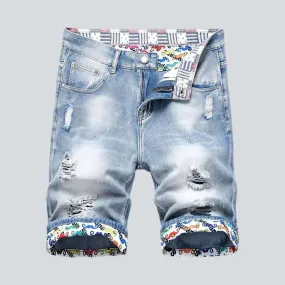 Painted hem ripped denim shorts