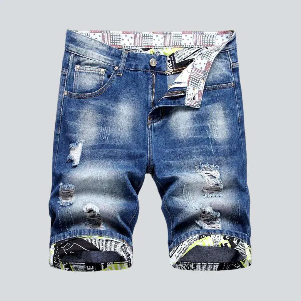 Painted hem ripped denim shorts